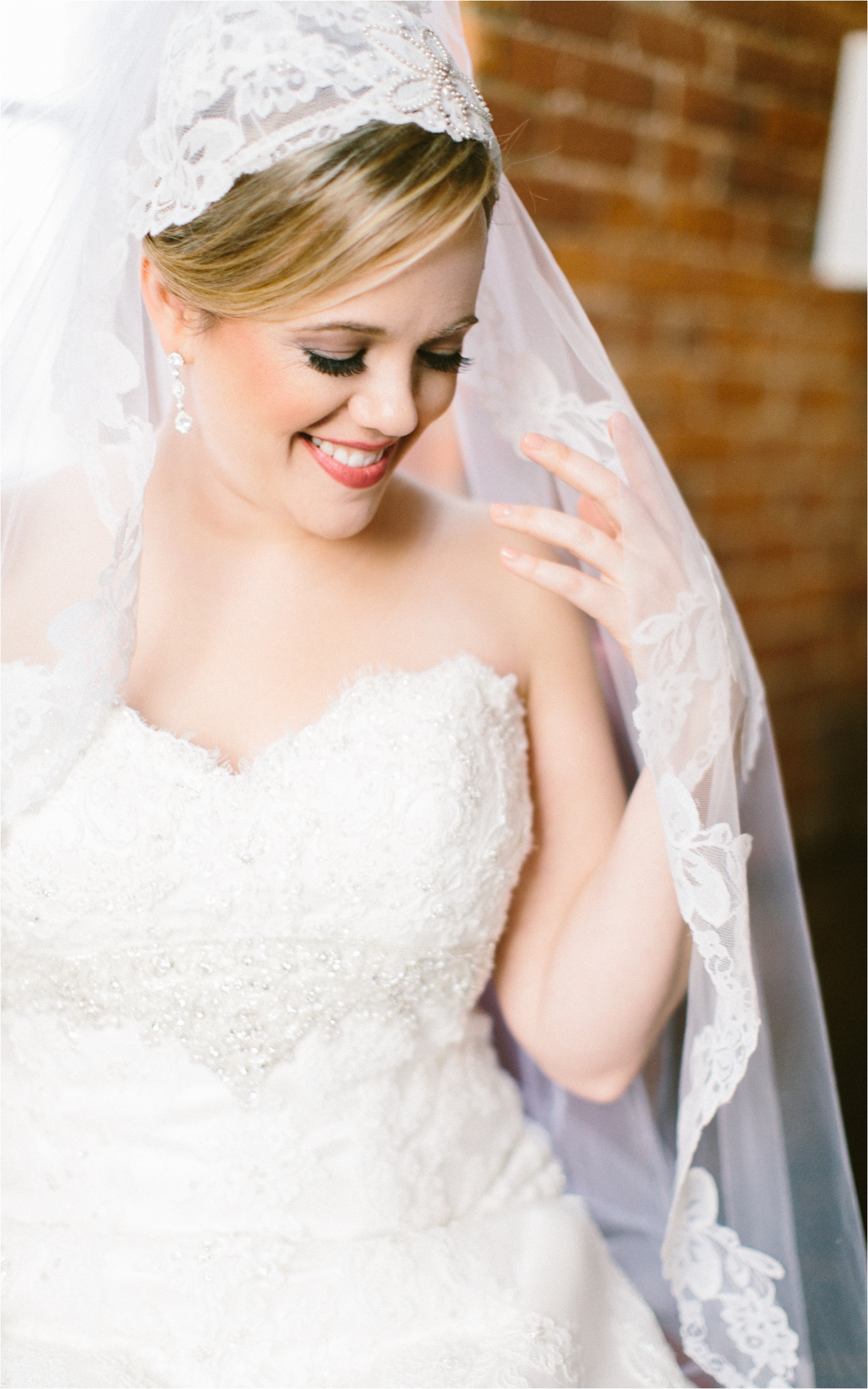 Bride wearing her mother's vintage veil by Brianna Wilbur Photography