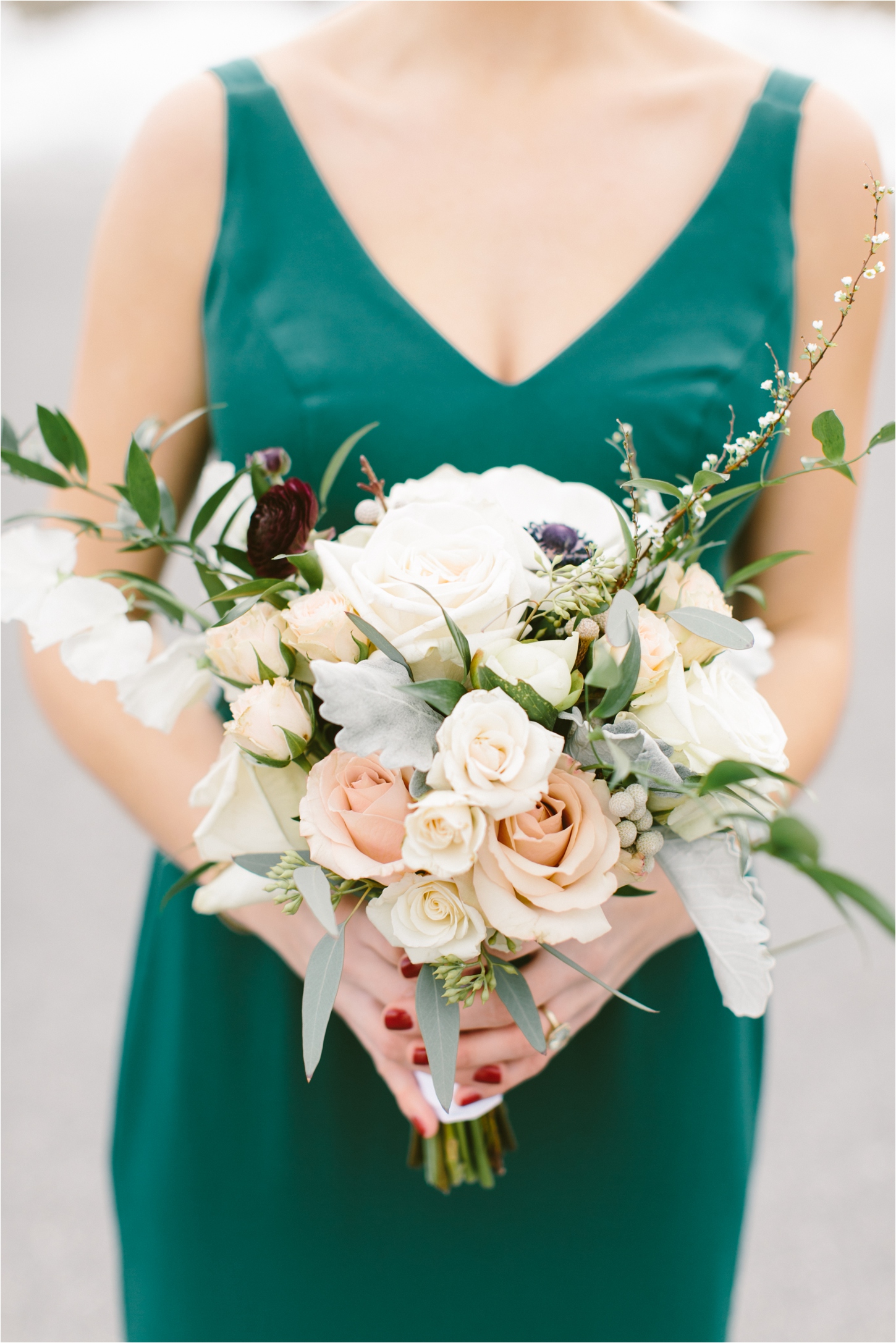Jade green bridesmaid dresses with neutral winter florals by Sullivan Owen