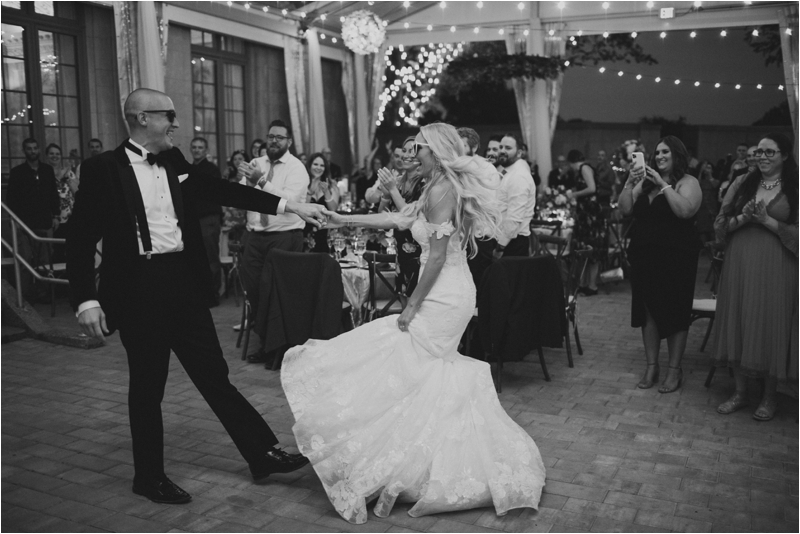 bride twirls during wedding reception in Philly PA