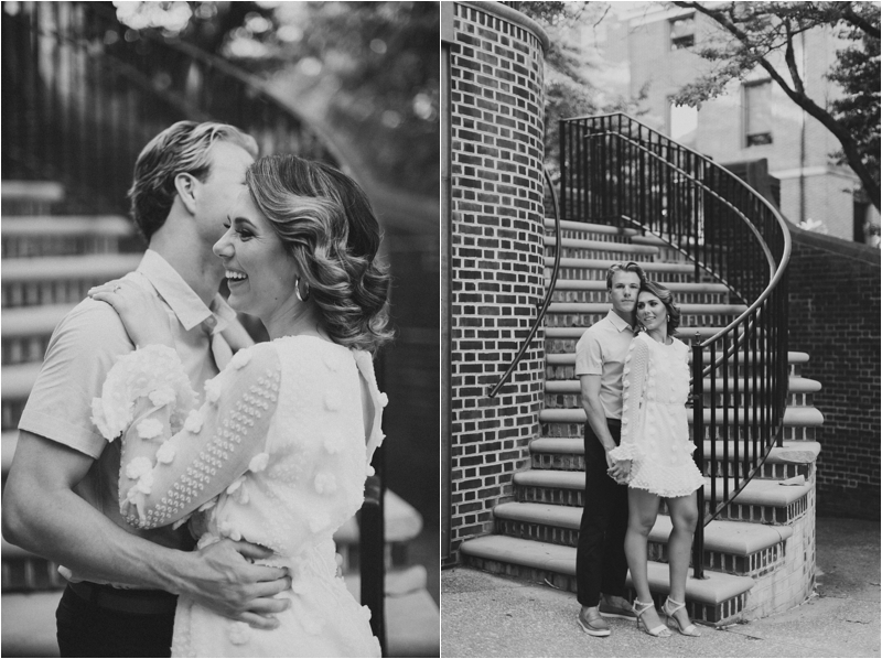 engaged couple poses by spiral staircase in Downtown Lancaster