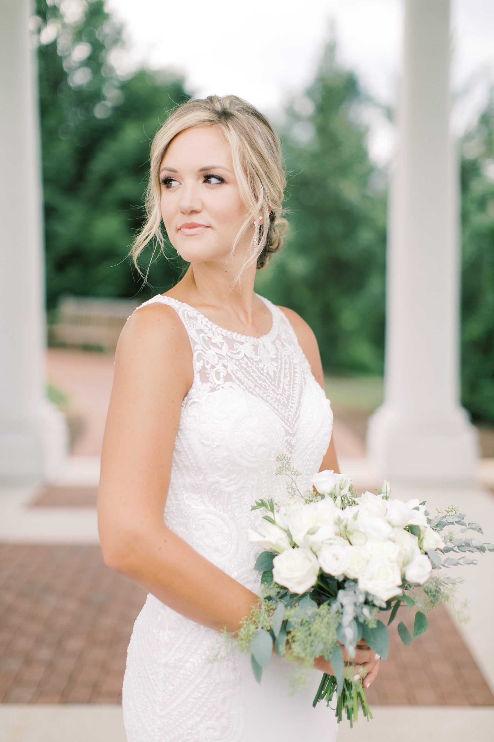 bridal portraits with wife holding bouquet during Hotel Hershey anniversary session