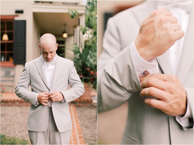 groom adjusts cufflinks before PA wedding day