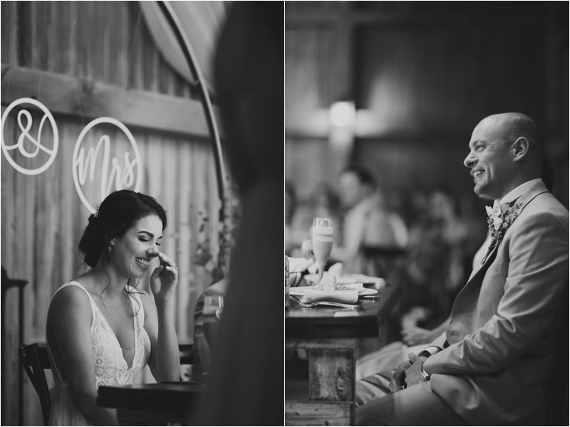 bride and groom laugh during wedding reception