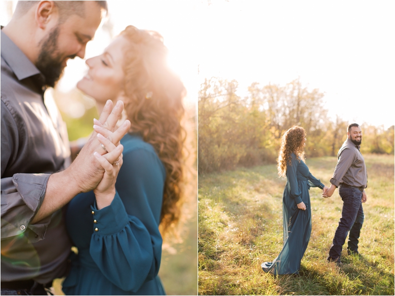 couple walks through field during farm engagement session